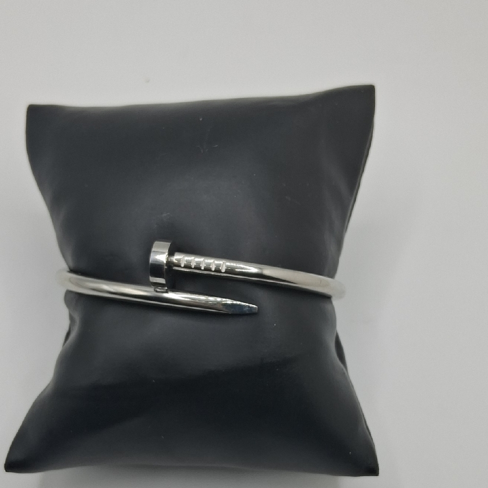 Elegant Silver Nail-Inspired Bracelet